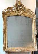 Miroir en bois sculpté et doré d’époque Régence 18ème